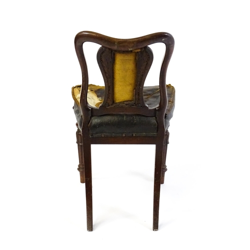 1637 - A 19thC mahogany side chair with a moulded and shaped backrest, vase shaped back splat and a leather... 