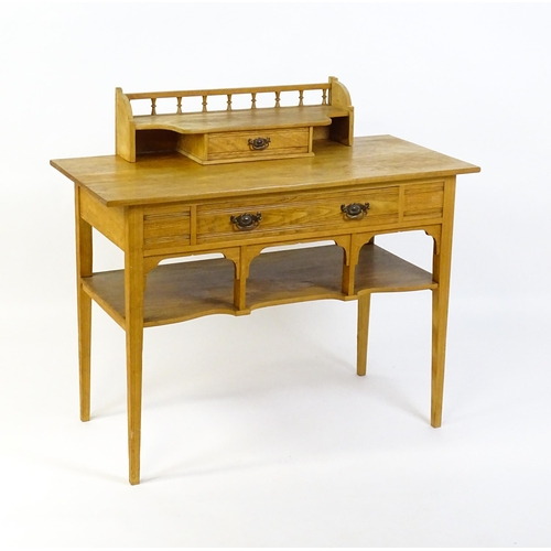 1642 - A late 19thC Aesthetic desk with a gallery and small drawer surmounting the top, the frieze having a... 