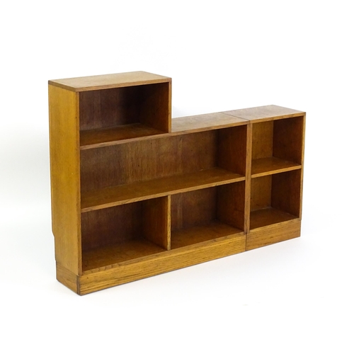 1669 - An early / mid 20thC Art Deco style oak bookcase with an open fronted shelves in six sections. 47