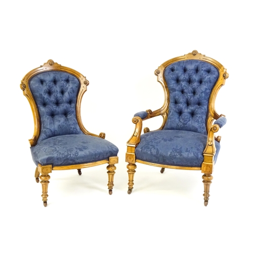 1679 - Two Victorian walnut chairs a fluted frame, carved rosettes and deep buttoned backrests above sprung... 