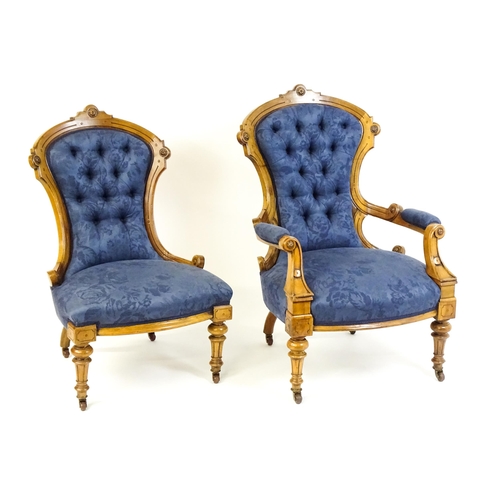 1679 - Two Victorian walnut chairs a fluted frame, carved rosettes and deep buttoned backrests above sprung... 