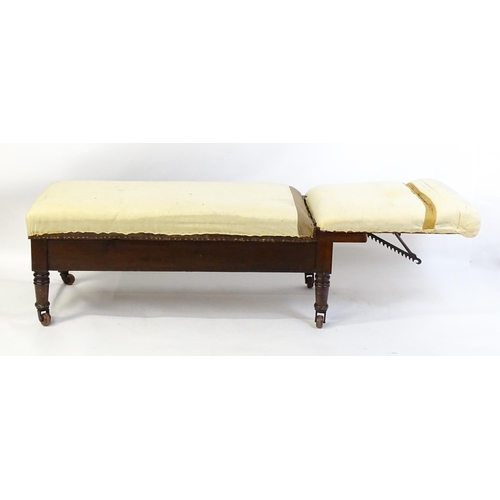 1705 - A Victorian 'Carters Literary Machine' day bed with an adjustable backrest above two short drawers w... 