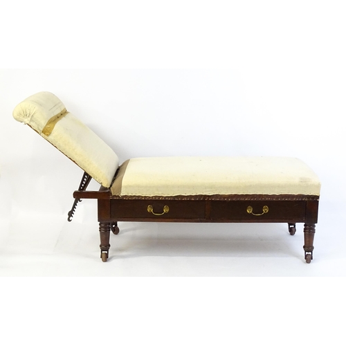 1705 - A Victorian 'Carters Literary Machine' day bed with an adjustable backrest above two short drawers w... 