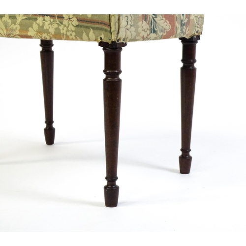 1755 - A late 18thC / early 19thC stool with an upholstered top above four turned tapering legs. 21