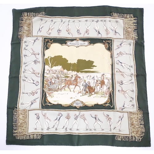 1091 - Vintage fashion / clothing: A boxed Hermes green silk 'Les Plaisirs du Froid' scarf by Hugo Grykar. ... 