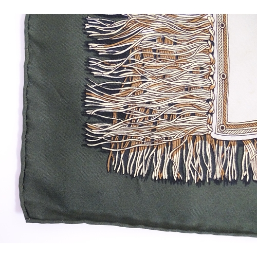 1091 - Vintage fashion / clothing: A boxed Hermes green silk 'Les Plaisirs du Froid' scarf by Hugo Grykar. ... 