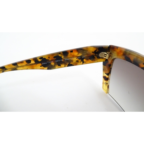 1094 - Vintage fashion / clothing: A pair of Miu Miu tortoiseshell rasoir cutoff rimless bottom sunglasses,... 