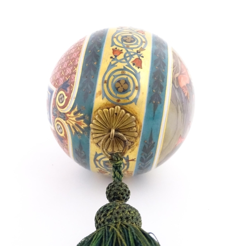 1096 - A 20thC Russian porcelain Easter egg decorated with the Resurrection of Christ to one side, and a cr... 