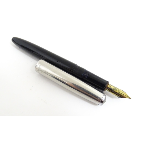 1220A - A quantity of fountain pens, comprising three Parker pens (including boxed Parker 51 model with 14k ... 