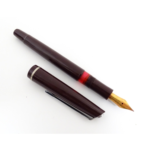 1220A - A quantity of fountain pens, comprising three Parker pens (including boxed Parker 51 model with 14k ... 