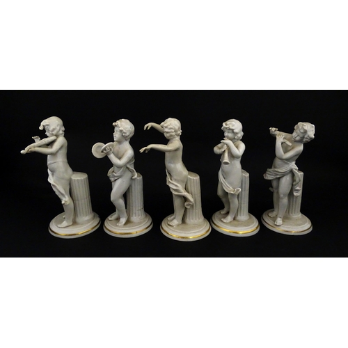 200 - Five Continental Classical putto figures with musical instruments. Approx. 6