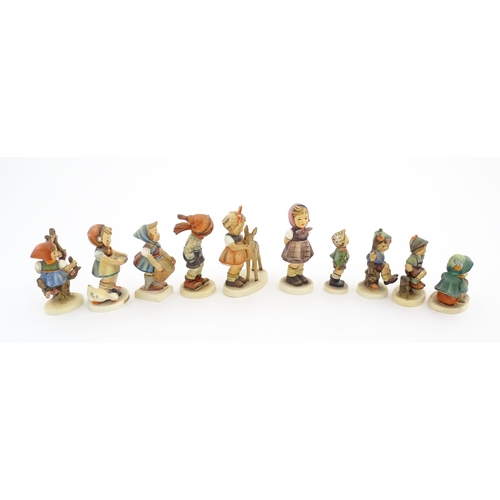 200A - A quantity of Hummel / Goebel figures to include Apple Tree Girl no. 141, Apple Tree Boy no. 142, Be... 