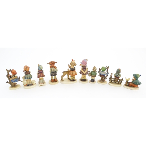 200A - A quantity of Hummel / Goebel figures to include Apple Tree Girl no. 141, Apple Tree Boy no. 142, Be... 