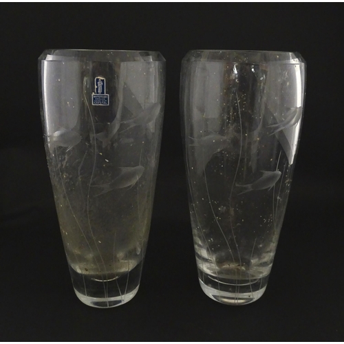 204 - A pair of Whitefriars glass vases each with engraved fish and reed decoration designed by Geoffrey B... 