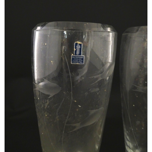 204 - A pair of Whitefriars glass vases each with engraved fish and reed decoration designed by Geoffrey B... 