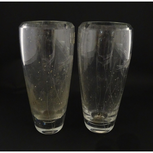 204 - A pair of Whitefriars glass vases each with engraved fish and reed decoration designed by Geoffrey B... 