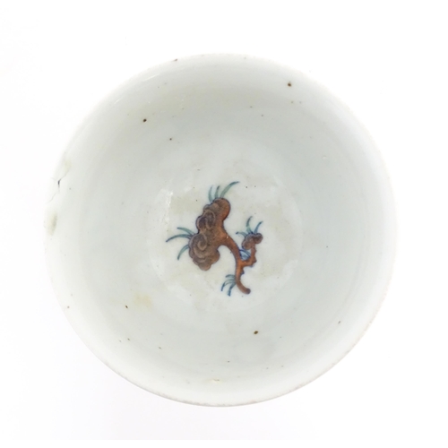 29 - A Chinese pedestal wine cup / bowl decorated with horses. Character marks under. Approx. 5