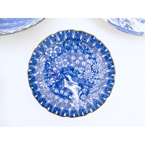 55A - Six assorted Japanese items to include plates decorated with flowers and birds, dishes with scrolled... 