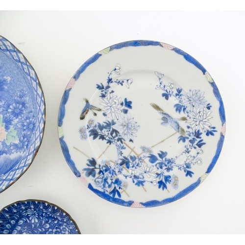 55A - Six assorted Japanese items to include plates decorated with flowers and birds, dishes with scrolled... 