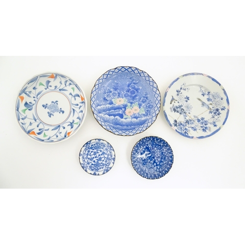 55A - Six assorted Japanese items to include plates decorated with flowers and birds, dishes with scrolled... 