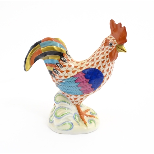 79 - A Herend porcelain model of a cockerel / rooster with fishnet decoration and gilt highlights. Marked... 