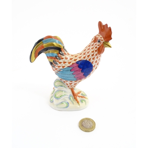 79 - A Herend porcelain model of a cockerel / rooster with fishnet decoration and gilt highlights. Marked... 