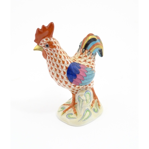 79 - A Herend porcelain model of a cockerel / rooster with fishnet decoration and gilt highlights. Marked... 