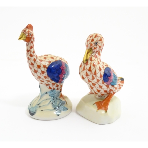 81 - Two Herend porcelain models of birds comprising guinea fowl, and duck, both with fishnet decoration ... 