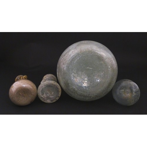 217A - Four glass vases in the Roman style with iridescent finish, some with trail detail. Largest approx. ... 