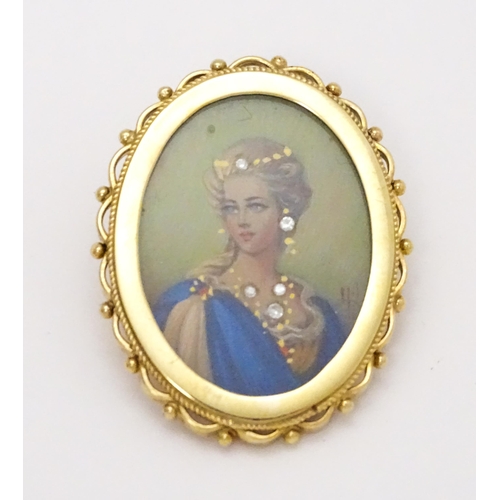 793 - A 9ct gold pendant / brooch with hand painted portrait miniature to centre set with diamonds and sig... 