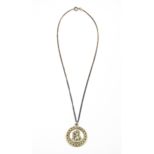 794 - A silver St. Christopher pendant on chain, the pendant marked GJ Ltd. for Georg Jensen Ltd. Chain ap... 