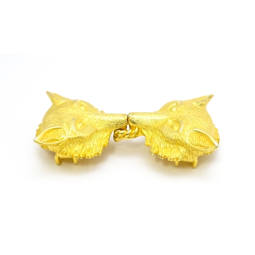 796 - A gilt metal two part belt buckle with fox head detail by Paquette. Approx. 3 1/2