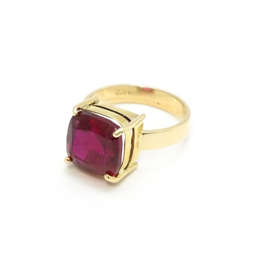 800 - A 9ct gold ring set with central ruby. Ring size approx. Q