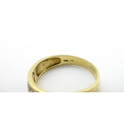 801 - A 14ct gold ring set with diamonds. Ring size approx. P 1/2