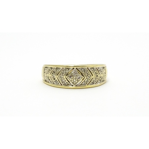 801 - A 14ct gold ring set with diamonds. Ring size approx. P 1/2