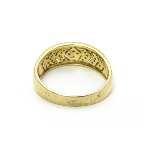 801 - A 14ct gold ring set with diamonds. Ring size approx. P 1/2