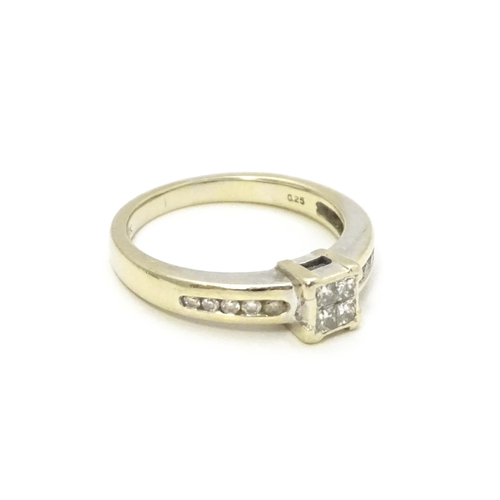 808 - An 18ct white gold ring set with central diamond flanked by further diamonds to shoulders. Ring size... 