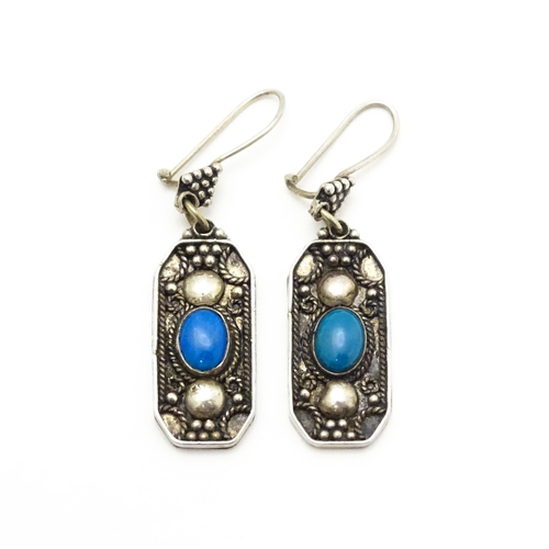 840 - A pair of .925 silver drop earrings set with turquoise coloured cabochon, stamped Ozgazi. Approx 1 1... 