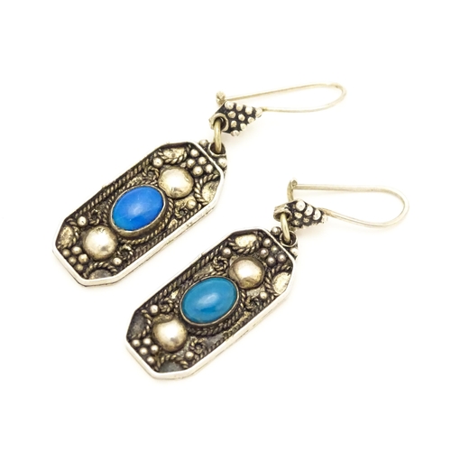 840 - A pair of .925 silver drop earrings set with turquoise coloured cabochon, stamped Ozgazi. Approx 1 1... 