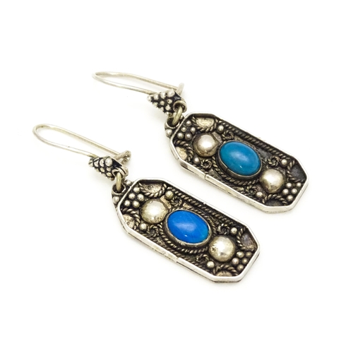 840 - A pair of .925 silver drop earrings set with turquoise coloured cabochon, stamped Ozgazi. Approx 1 1... 