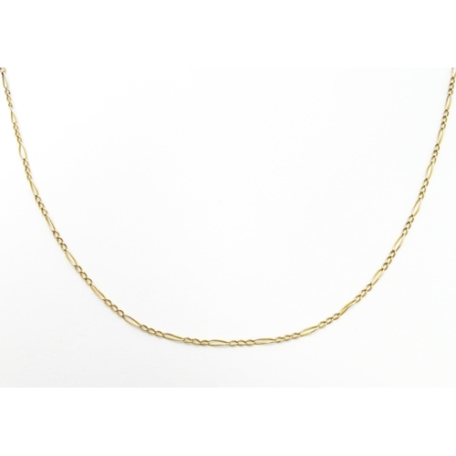 843 - A 9ct gold necklace with yellow metal clasp. Approx 30