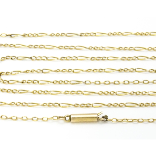 843 - A 9ct gold necklace with yellow metal clasp. Approx 30