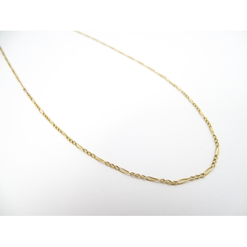 843 - A 9ct gold necklace with yellow metal clasp. Approx 30