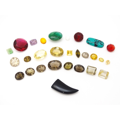 845 - A quantity of assorted loose unmounted stones and beads etc.