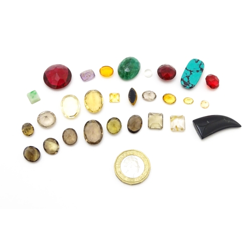 845 - A quantity of assorted loose unmounted stones and beads etc.