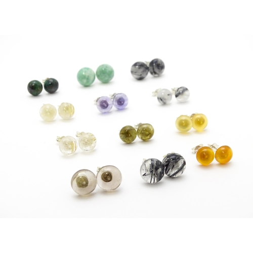 852 - Twelve assorted pairs of stud earrings set with cabochon detail