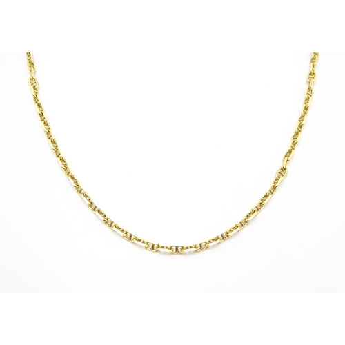 859 - An 18ct gold chain necklace. Approx. 20