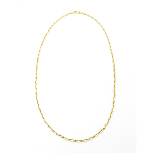 859 - An 18ct gold chain necklace. Approx. 20