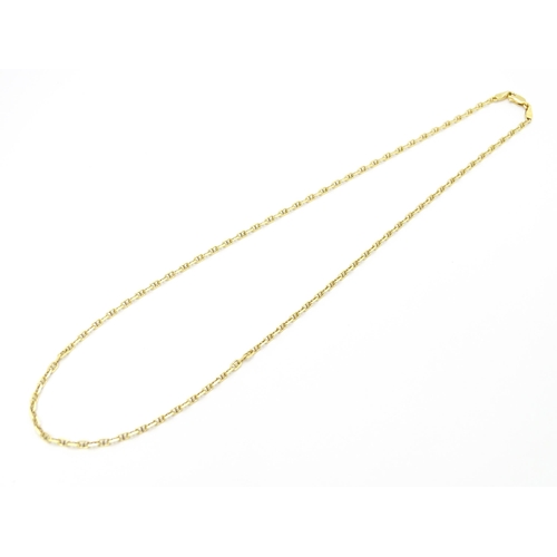 859 - An 18ct gold chain necklace. Approx. 20