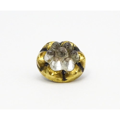 862 - Nine vintage buttons with black enamel and lobed decoration. Approx. 1/2